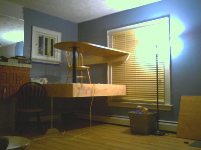 From across living room, seated.