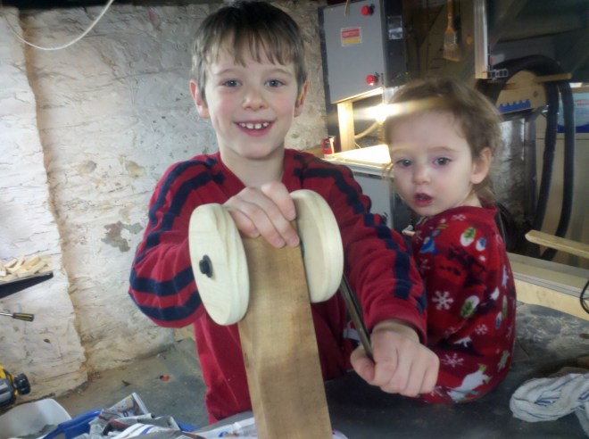 Eli turning the wrench.